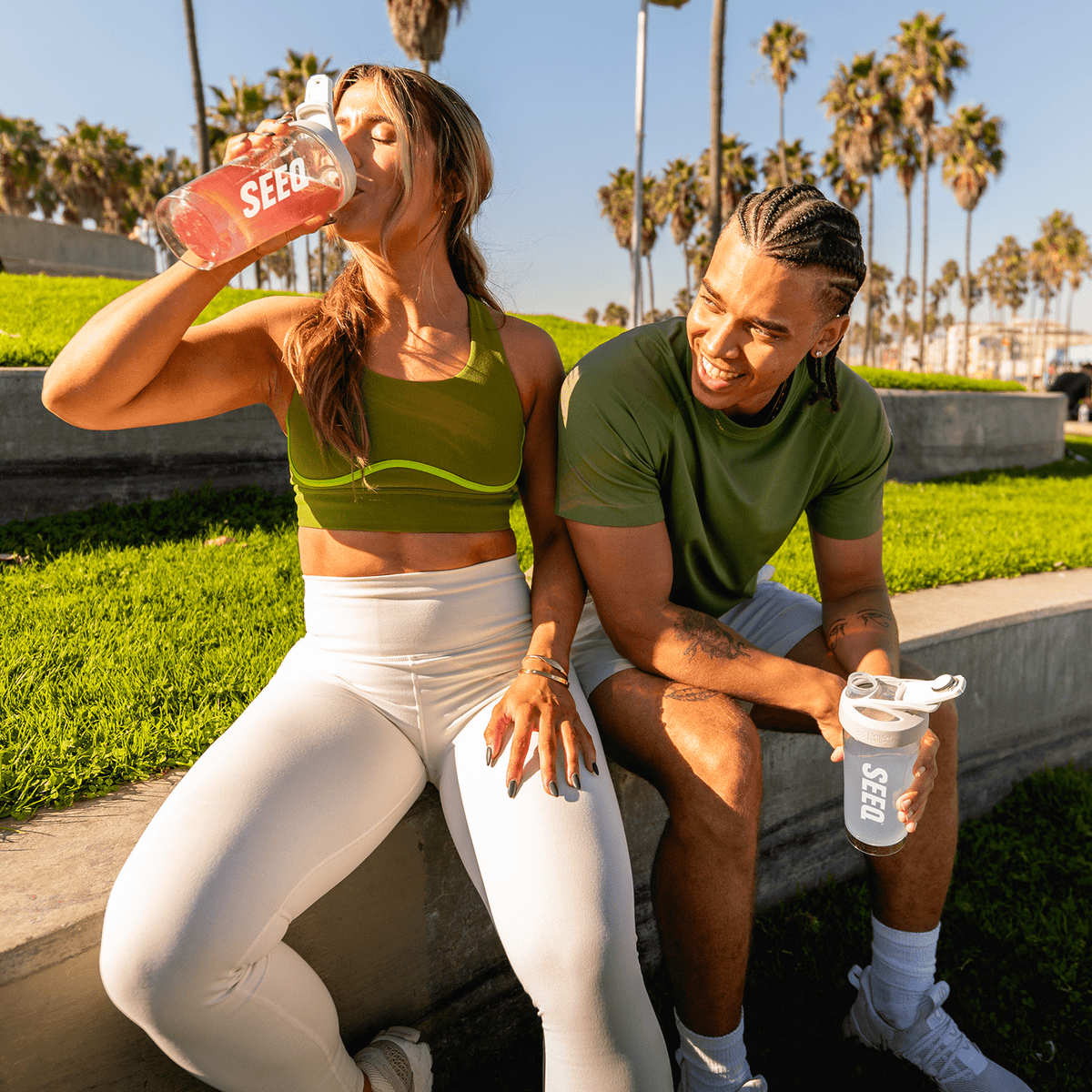 People Enjoying Seeq Protein Drink In Park